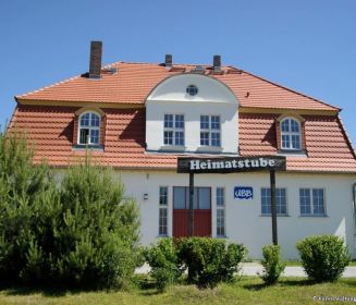 Logo von Bahnhofsgebäude mit Heimatstube